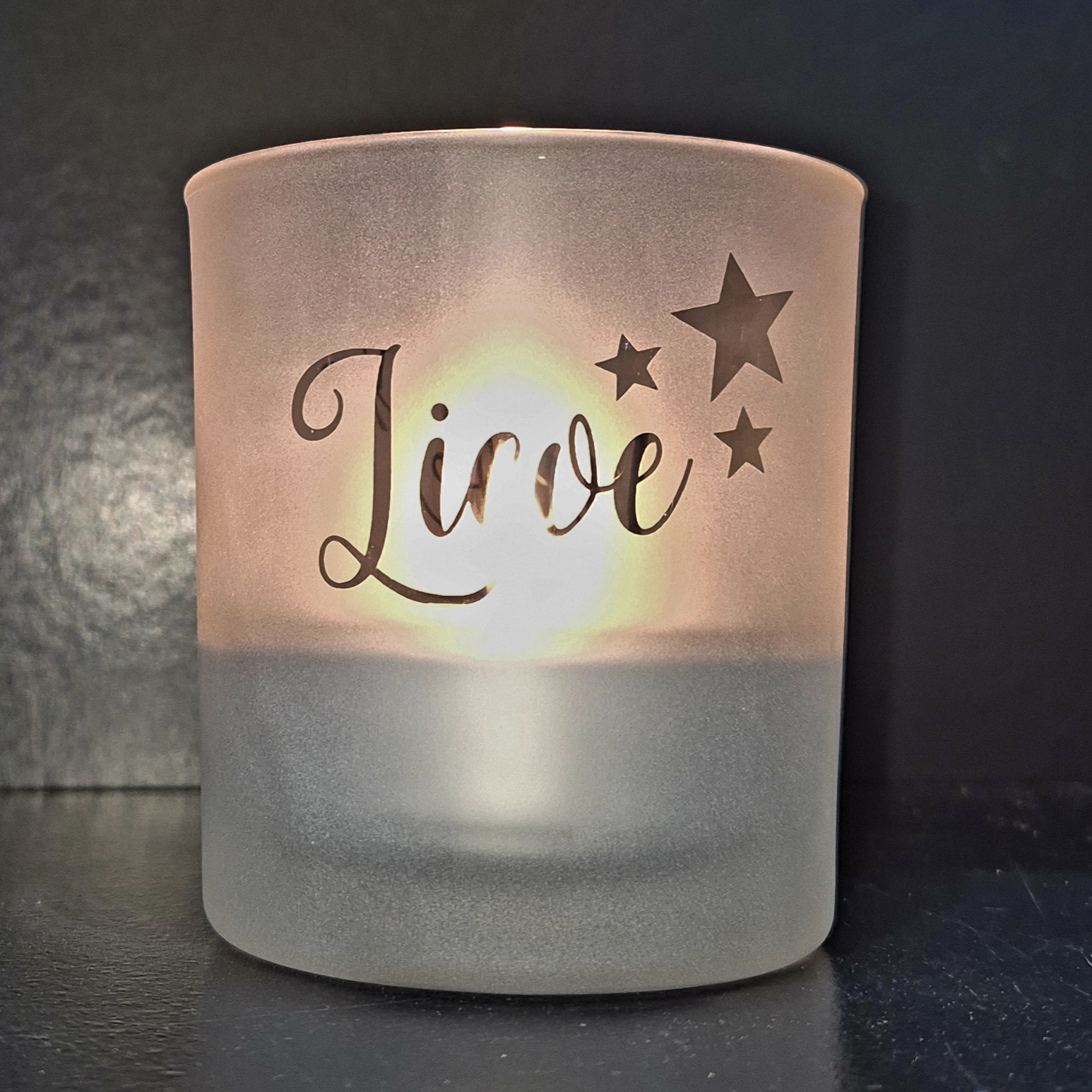 sfeerlicht met een sterren en een naam